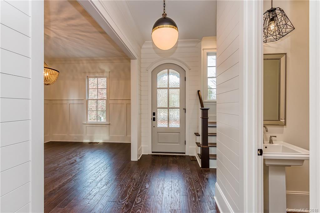 748 Ellsworth Road, Unit 47 Charlotte, NC 28211 - Photo 3 of 34 wooden floor in an empty room with a window