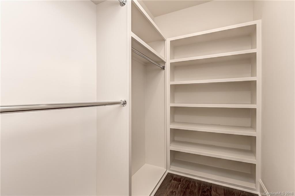 748 Ellsworth Road, Unit 47 Charlotte, NC 28211 - Photo 22 of 34 a view of walk in closet with empty racks