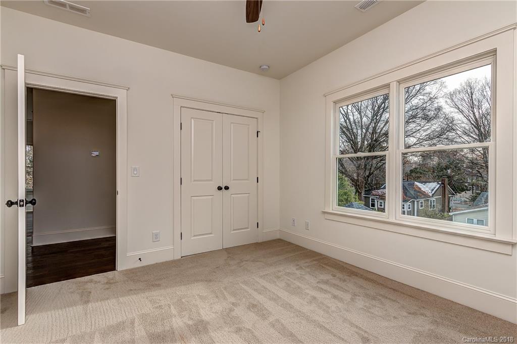 748 Ellsworth Road, Unit 47 Charlotte, NC 28211 - Photo 27 of 34 a view of an empty room with a window
