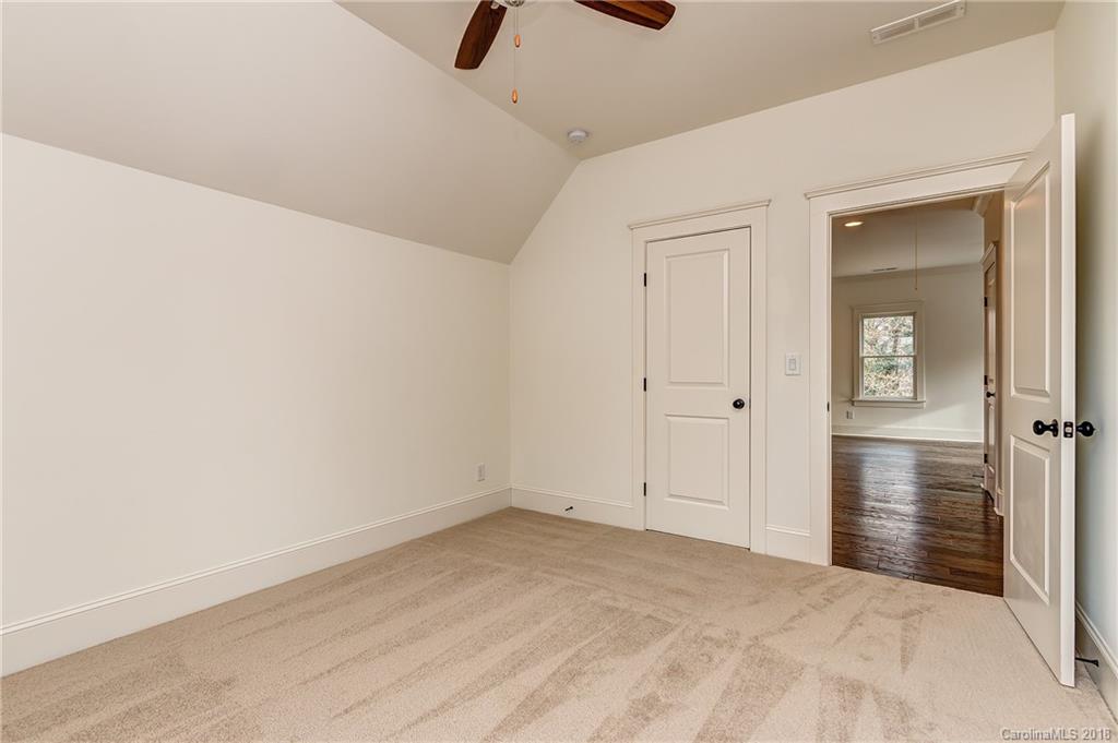 748 Ellsworth Road, Unit 47 Charlotte, NC 28211 - Photo 28 of 34 wooden floor in an empty room