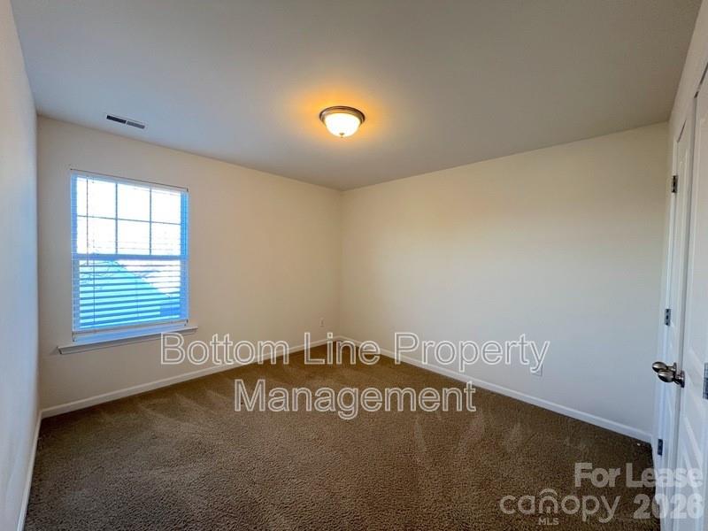 9737 Tidal Court Huntersville, NC 28078 - Photo 13 of 21 a view of an empty room and window
