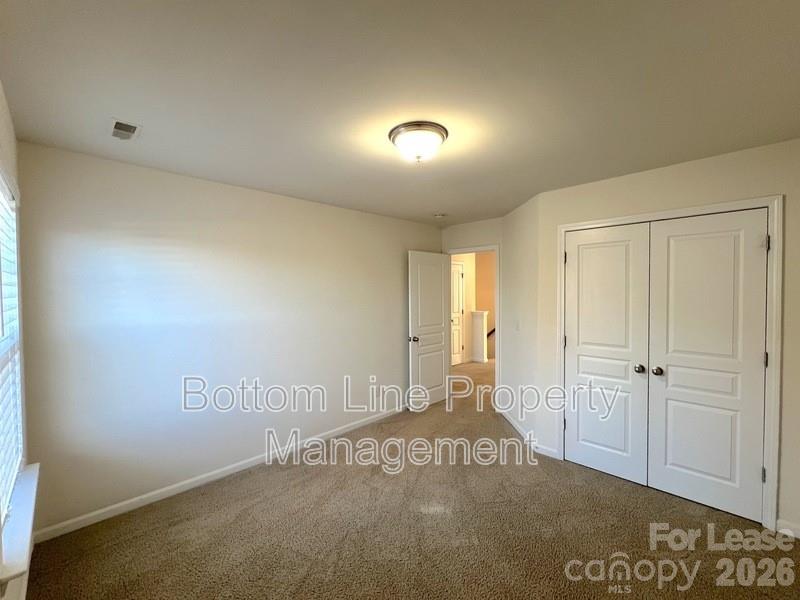 9737 Tidal Court Huntersville, NC 28078 - Photo 14 of 21 an empty room with a empty space
