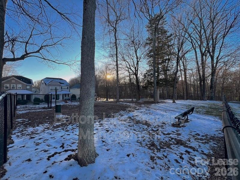 9737 Tidal Court Huntersville, NC 28078 - Photo 19 of 21 a backyard of a house with lots of green space