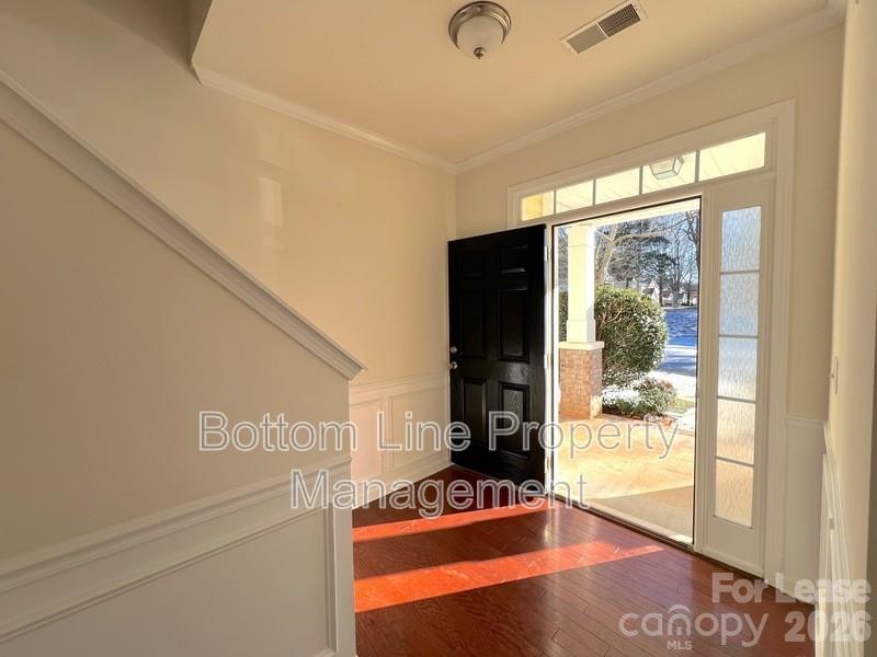 9737 Tidal Court Huntersville, NC 28078 - Photo 2 of 21 a view of an entryway with a floor to ceiling window