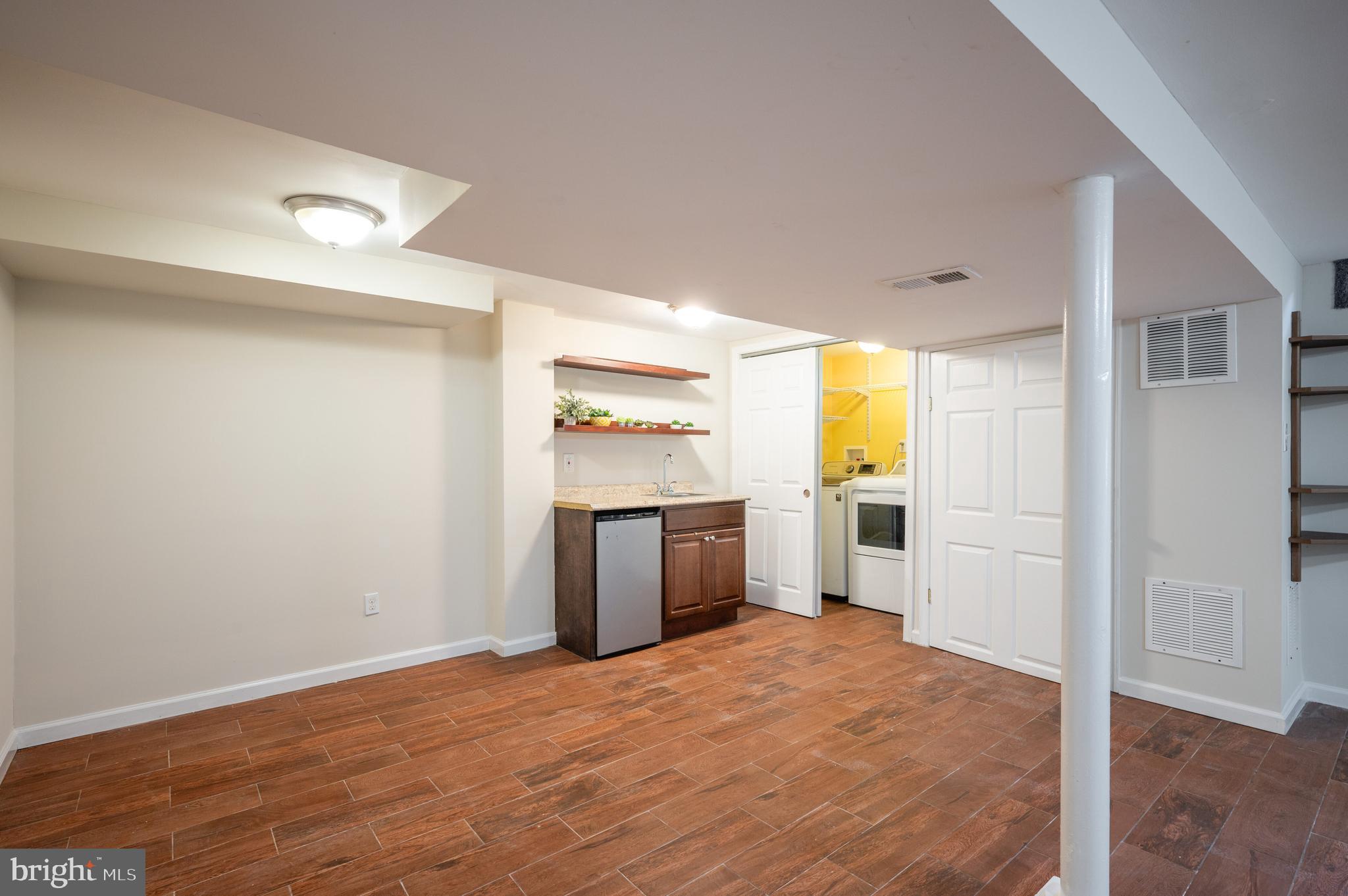 5207 Edgewood Road College Park, MD 20740 - Photo 30 of 41 Basement toward laundry
