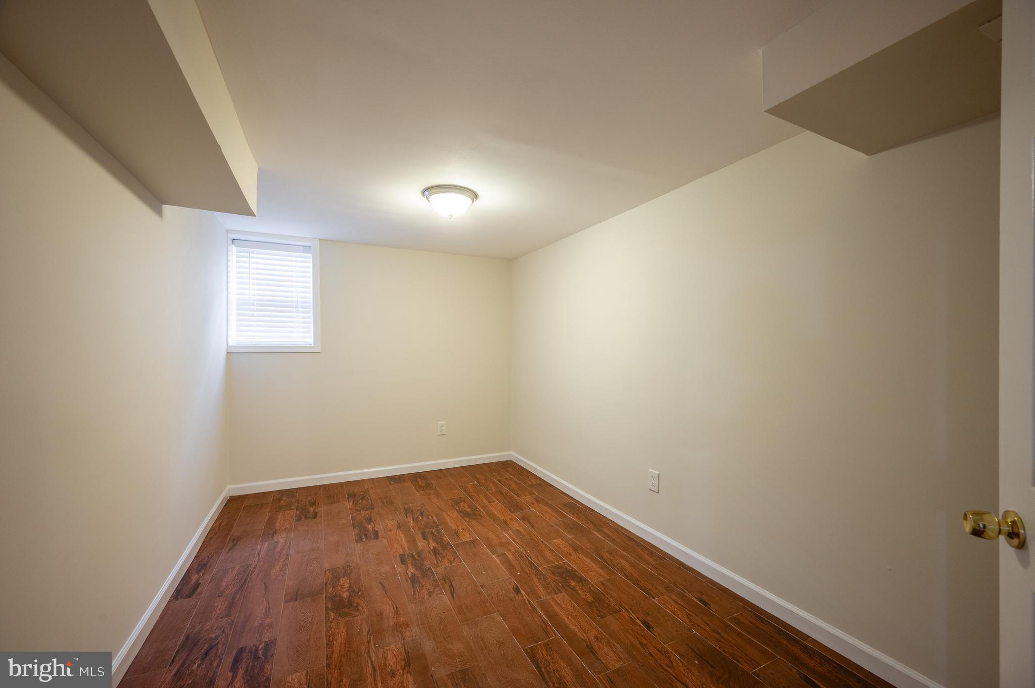 5207 Edgewood Road College Park, MD 20740 - Photo 35 of 41 Basement bedroom 5