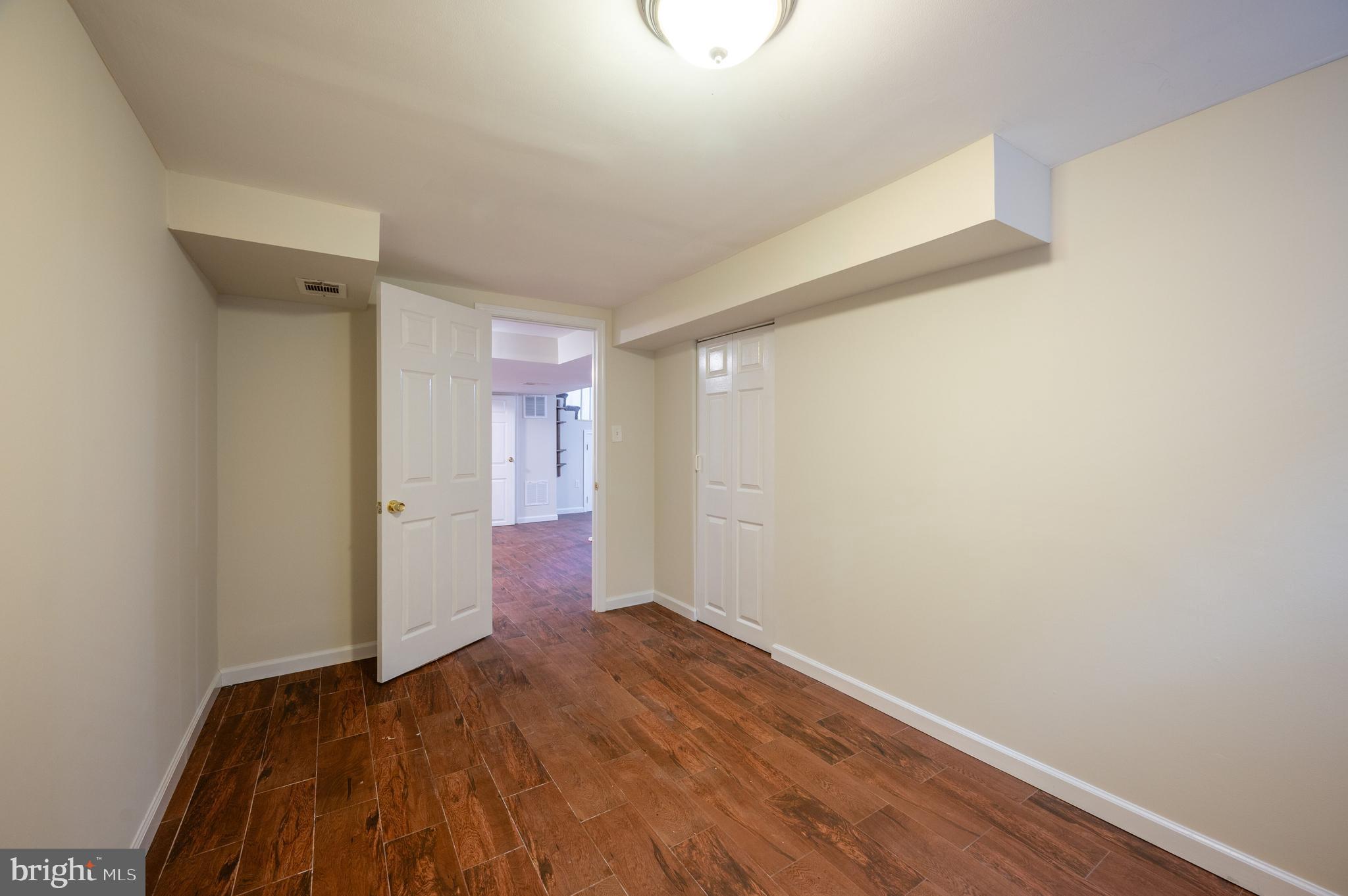 5207 Edgewood Road College Park, MD 20740 - Photo 36 of 41 Basement bedroom 5
