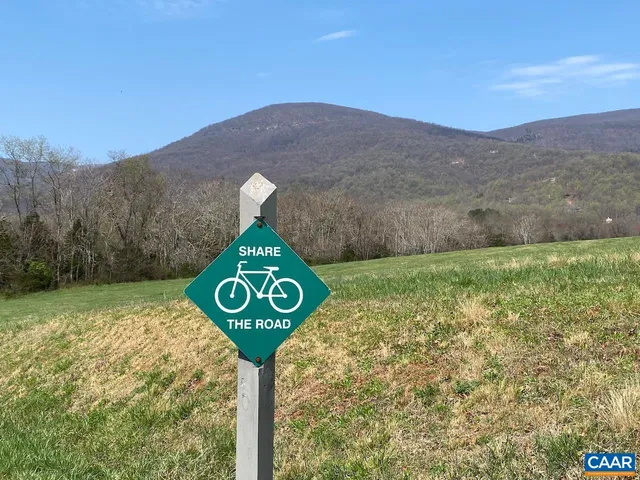 a sign that is on the side of a road