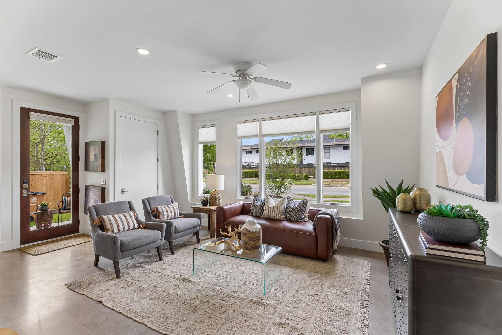 5305 Guadalupe Street, Unit A Austin, TX 78751 - Photo 7 of 31 Living room featuring recessed lighting, a ceiling fan, concrete floors, and healthy amount of natural light