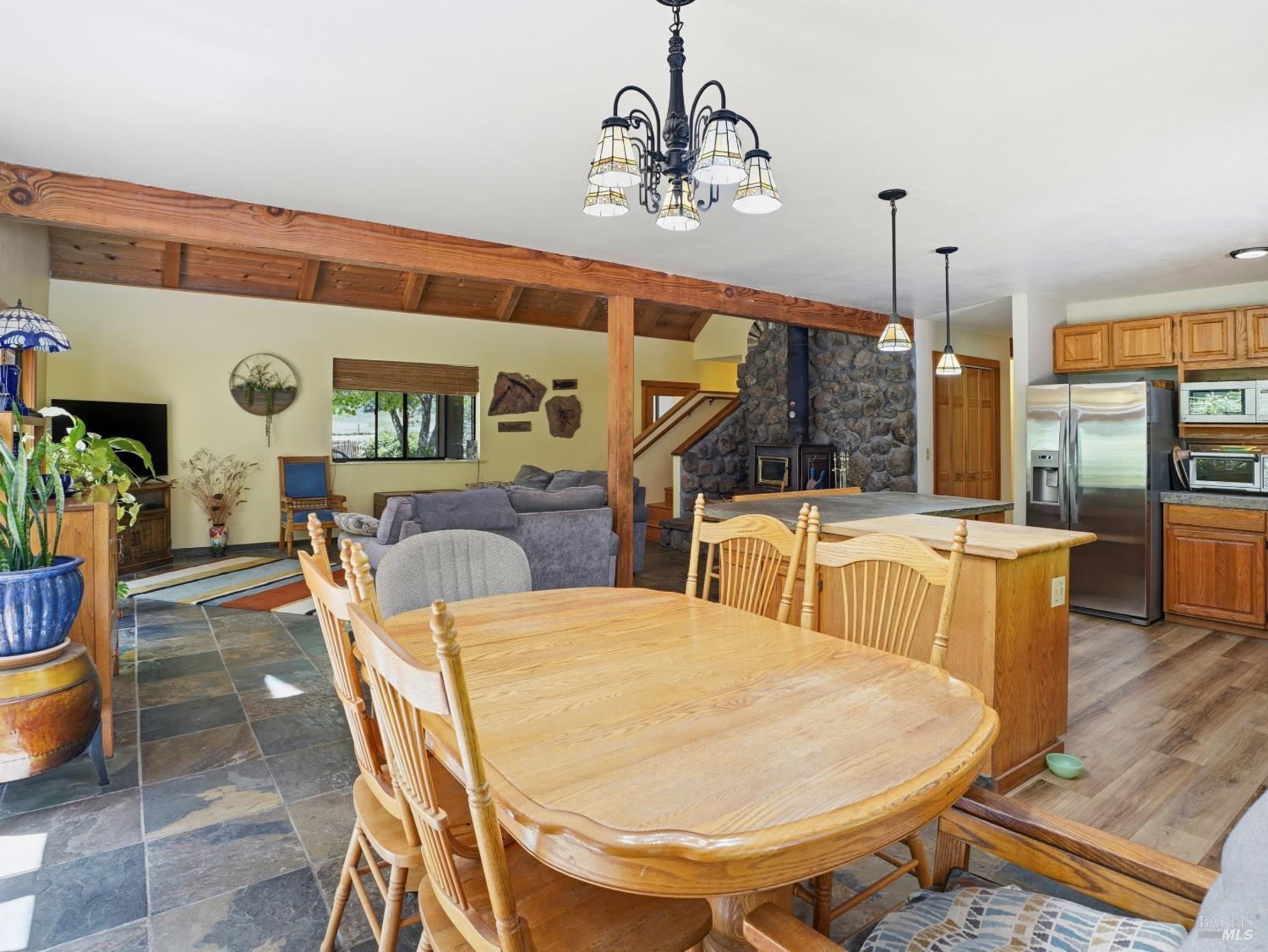 31397 Seaview Road Cazadero, CA 95421 - Photo 14 of 47 a view of a dining room with furniture