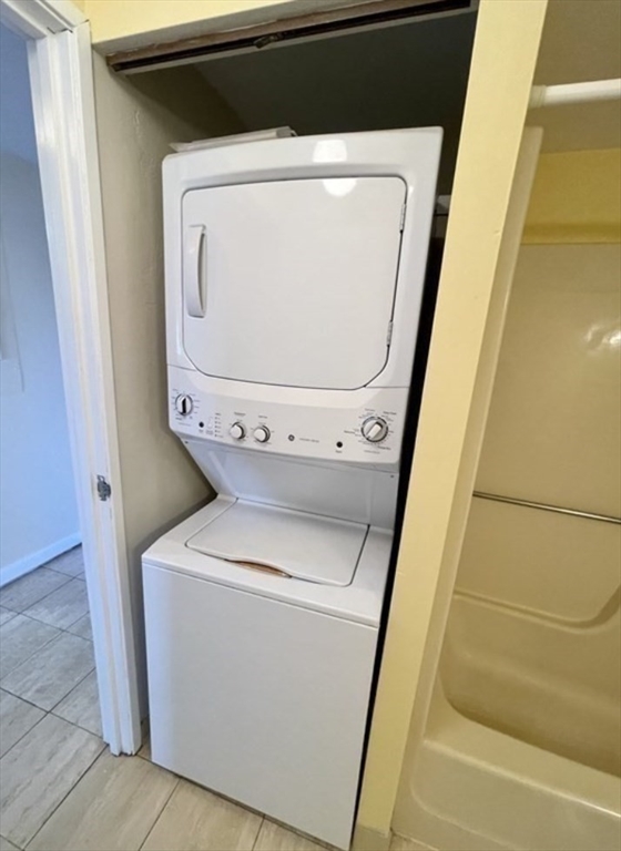 100 Cove Way, Unit 608 Quincy, MA 02169 - Photo 12 of 20 a utility room with dryer and washer
