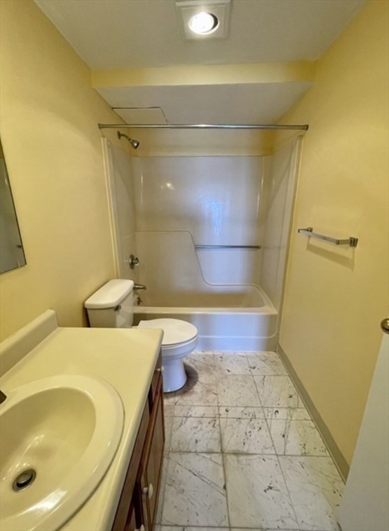 100 Cove Way, Unit 608 Quincy, MA 02169 - Photo 14 of 20 a bathroom with a sink and a shower