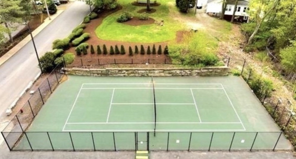 100 Cove Way, Unit 608 Quincy, MA 02169 - Photo 17 of 20 a view of a swimming pool with an outdoor space and seating area