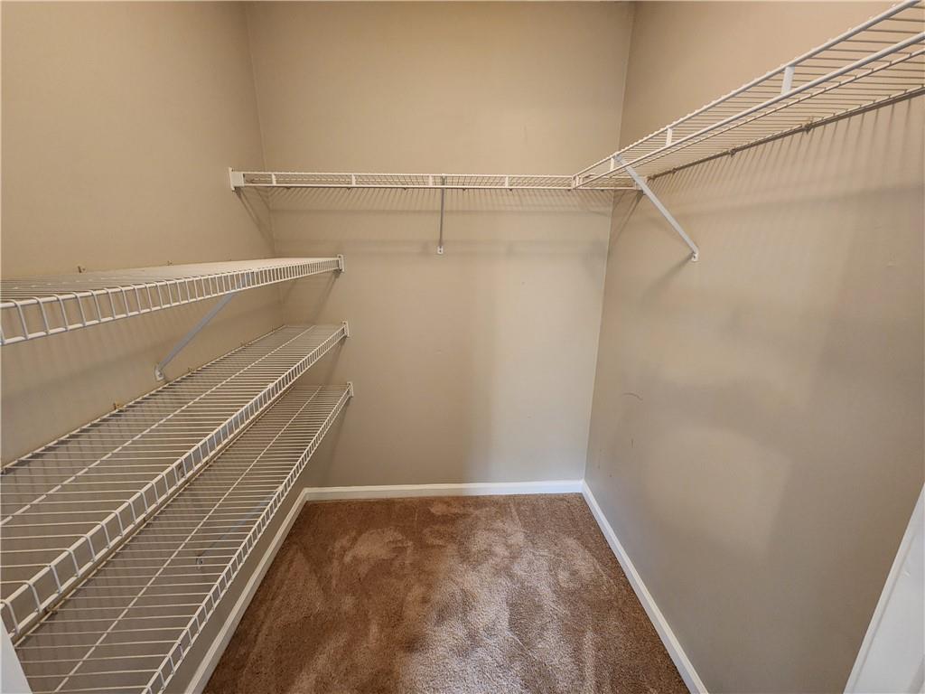 1411 Keys Crossing Drive Northeast Brookhaven, GA 30319 - Photo 11 of 24 a view of a room with racks on the wall