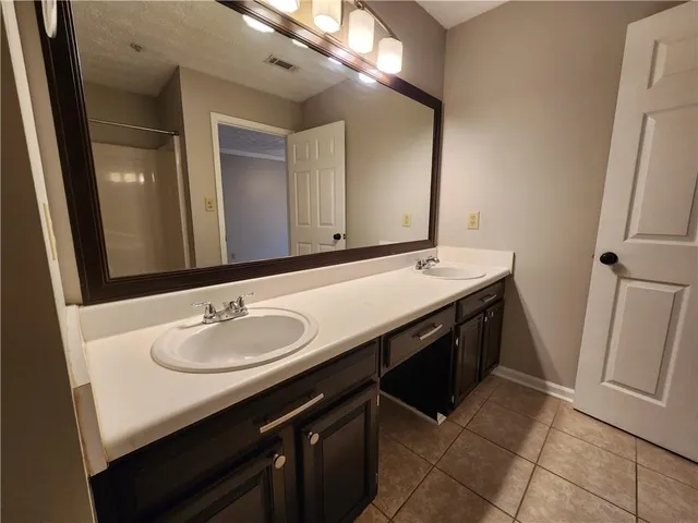 a view of a pathway with a house