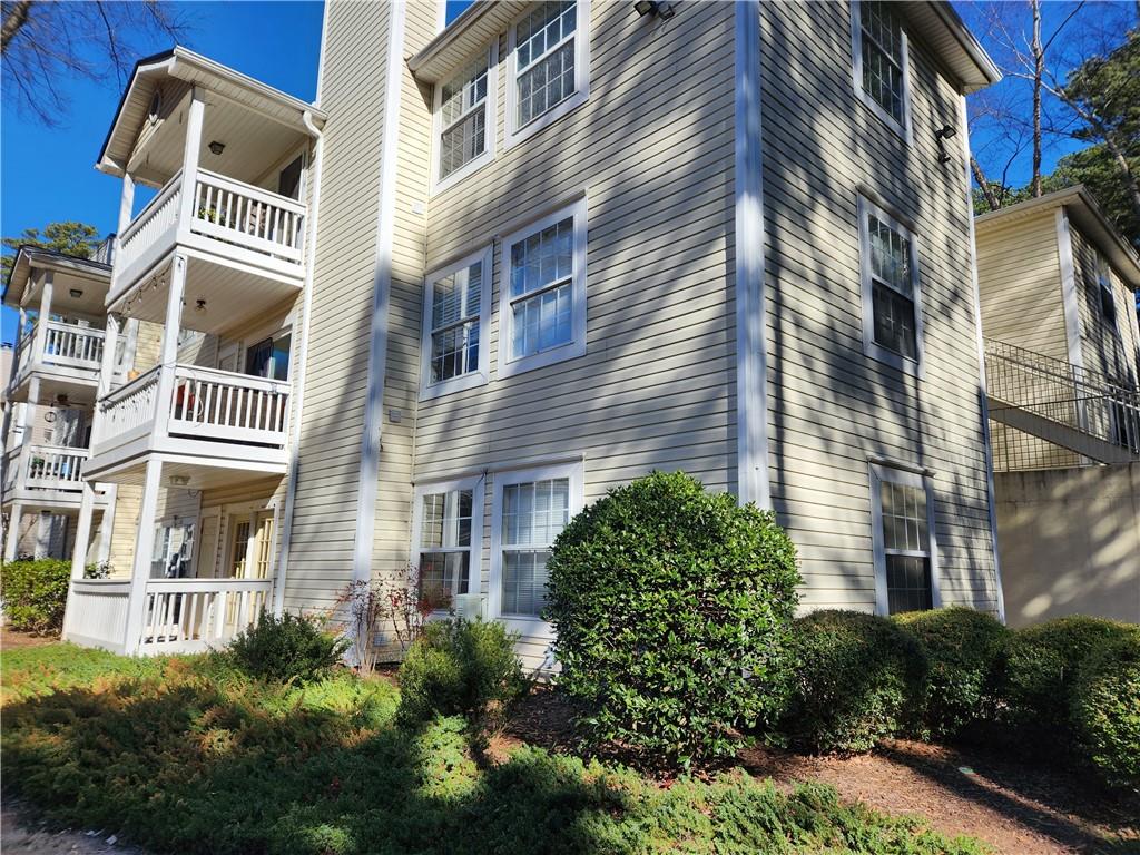 1411 Keys Crossing Drive Northeast Brookhaven, GA 30319 - Photo 21 of 24 a front view of a multi story residential apartment building