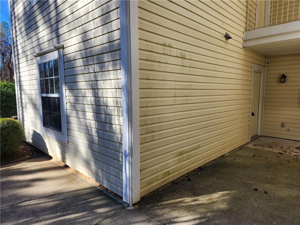 1411 Keys Crossing Drive Northeast Brookhaven, GA 30319 - Photo 24 of 24 a view of a porch with a door