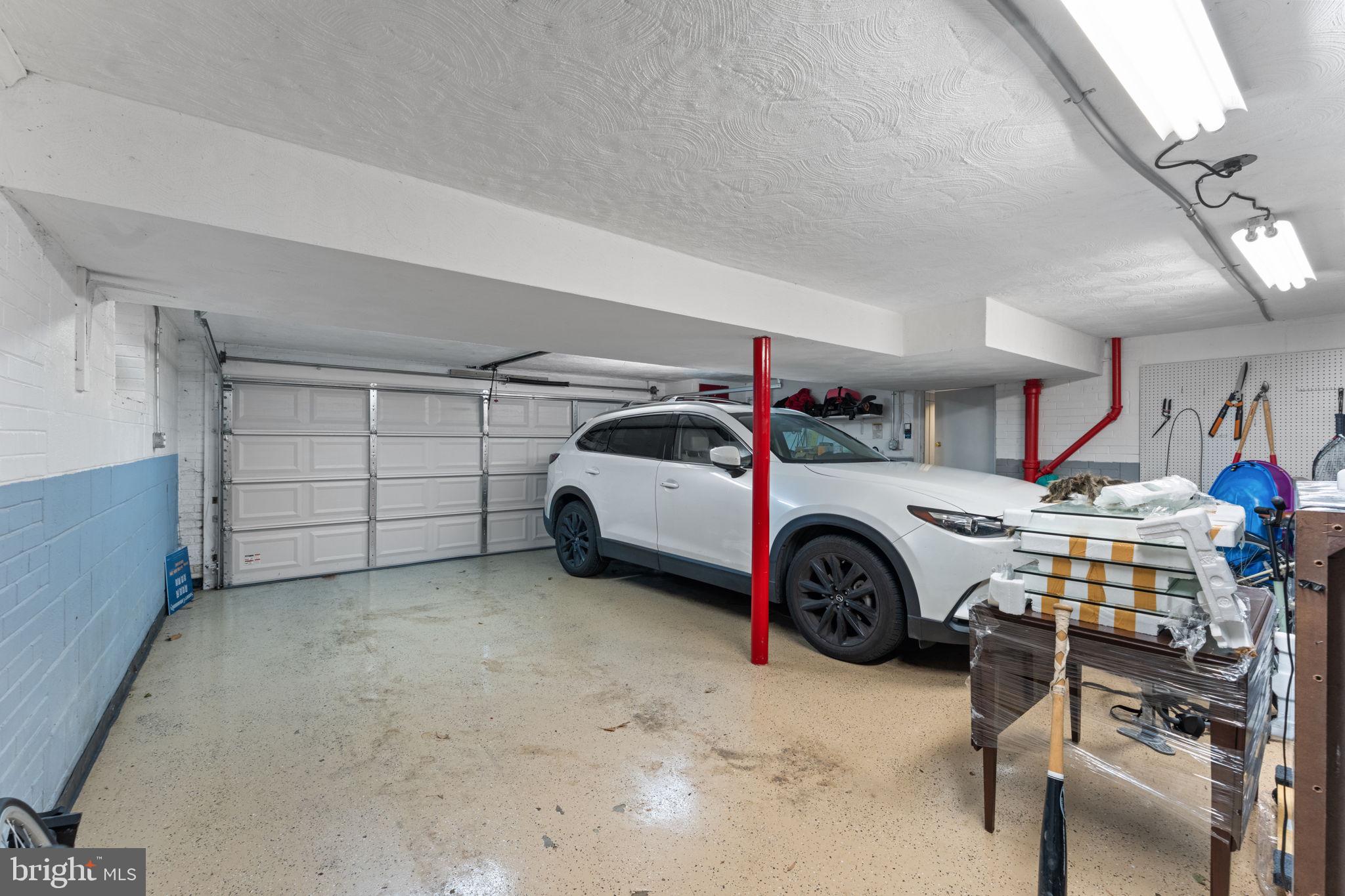 5121 Baltan Road Bethesda, MD 20816 - Photo 67 of 90 Spacious garage with modern vehicle.