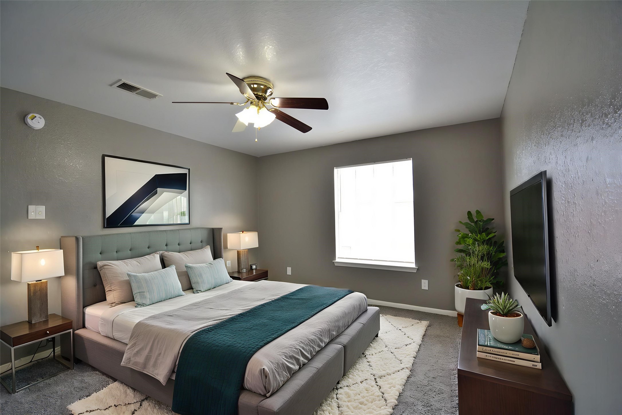 8904 Ledge Street Houston, TX 77075 - Photo 14 of 20 a bedroom with bed tv and window