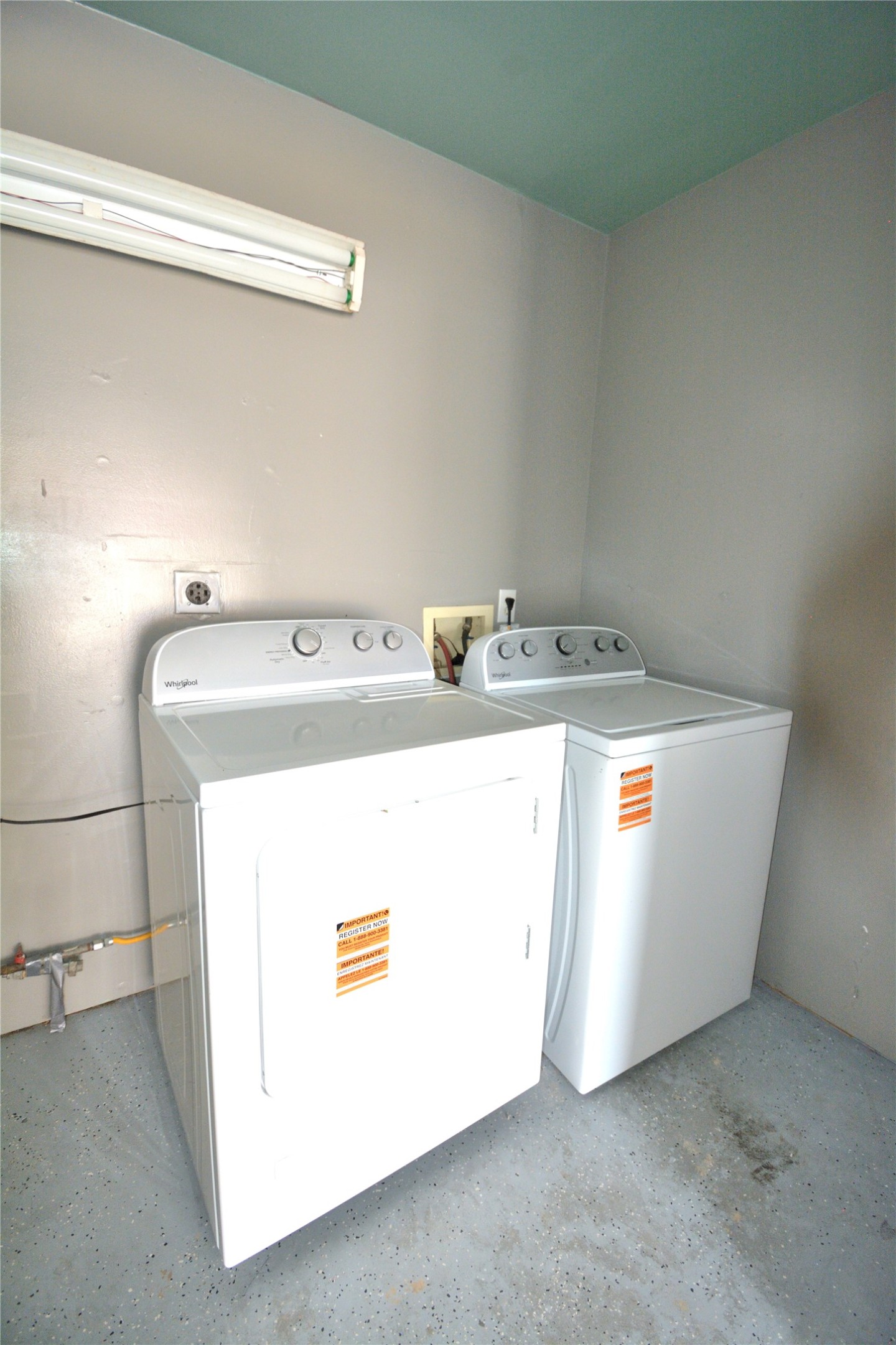 8904 Ledge Street Houston, TX 77075 - Photo 20 of 20 a utility room with dryer and washer
