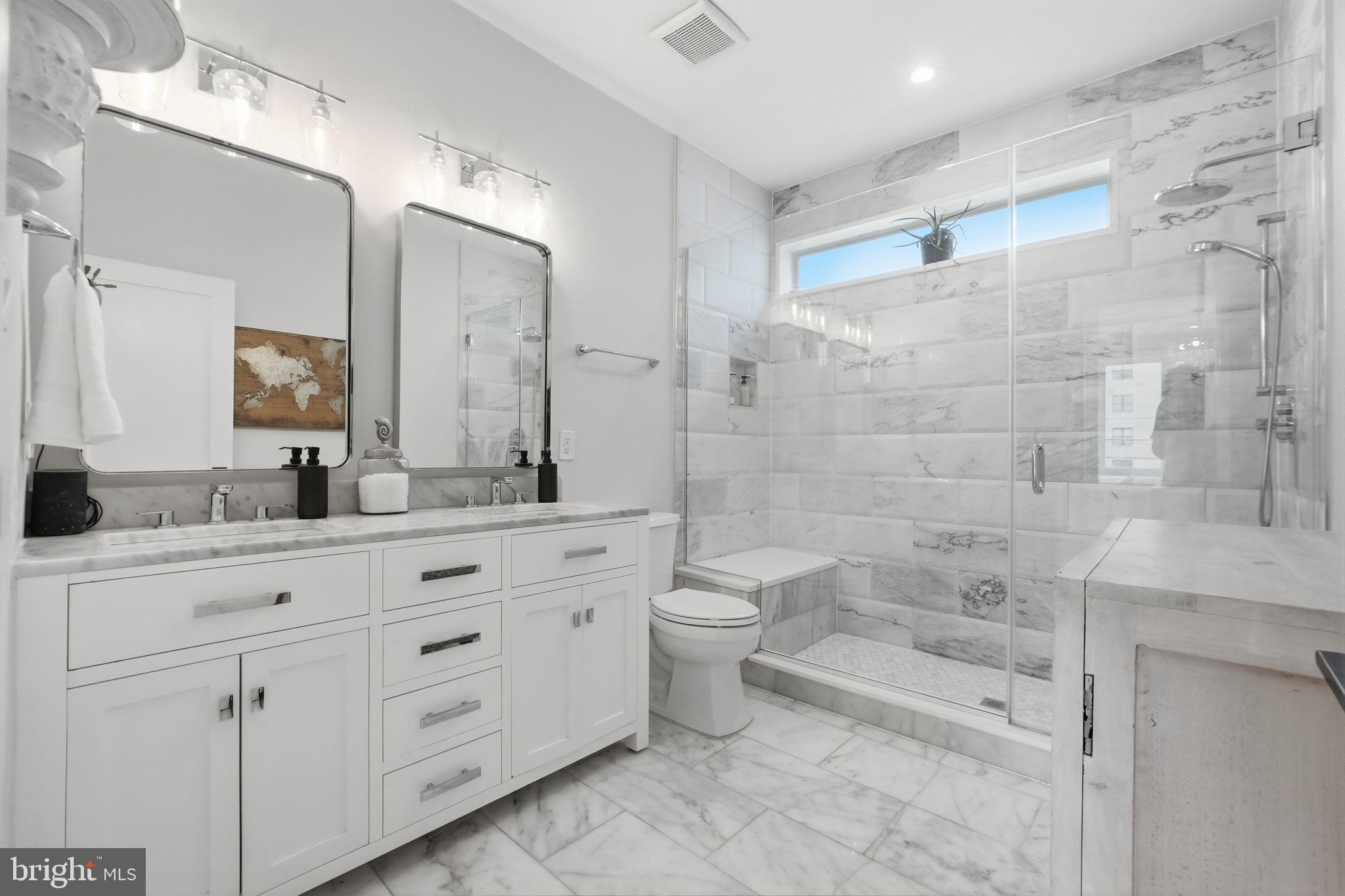 1216 I Street Northeast, Unit B Washington, DC 20002 - Photo 15 of 40 Luxurious primary sweet with double vanity