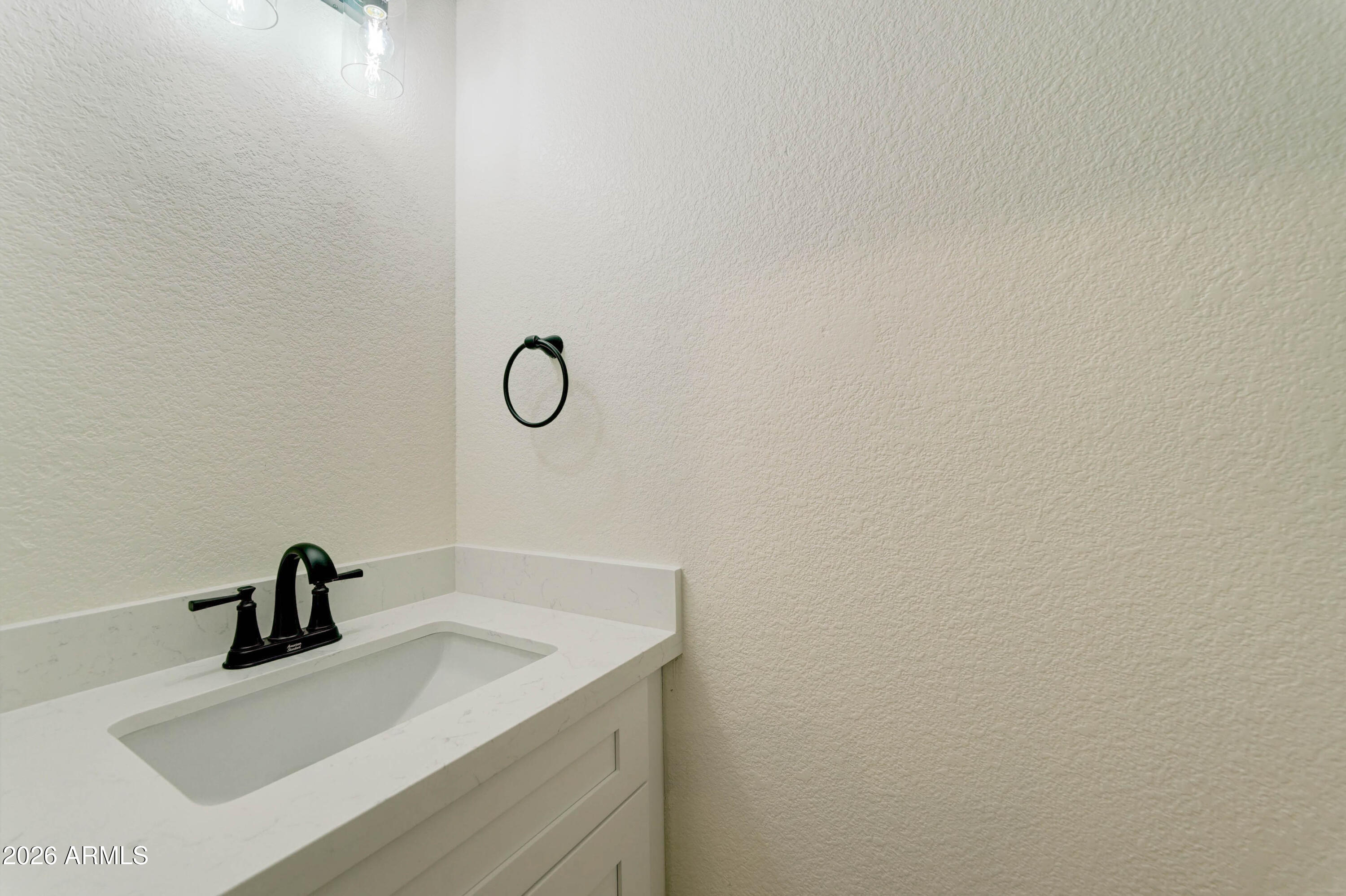 3491 South Chaparral Road Apache Junction, AZ 85119 - Photo 29 of 33 a close view of a sink and a vanity in the bathroom