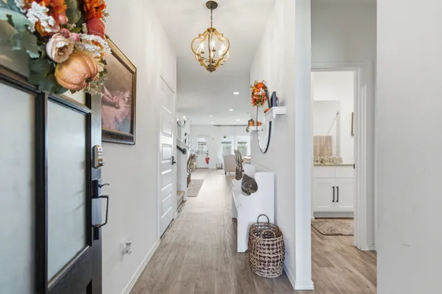 a kitchen with stainless steel appliances kitchen island granite countertop a sink and cabinets