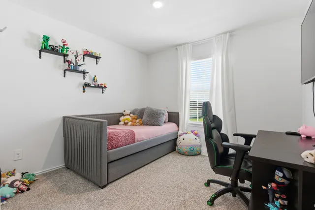 a bathroom with a granite countertop sink a toilet and bathtub