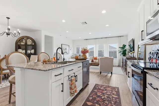 a view of a dining room with furniture