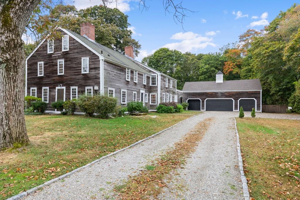 347 Main Street Hingham, MA 02043 - Photo 1 of 34 a front view of a house with garden