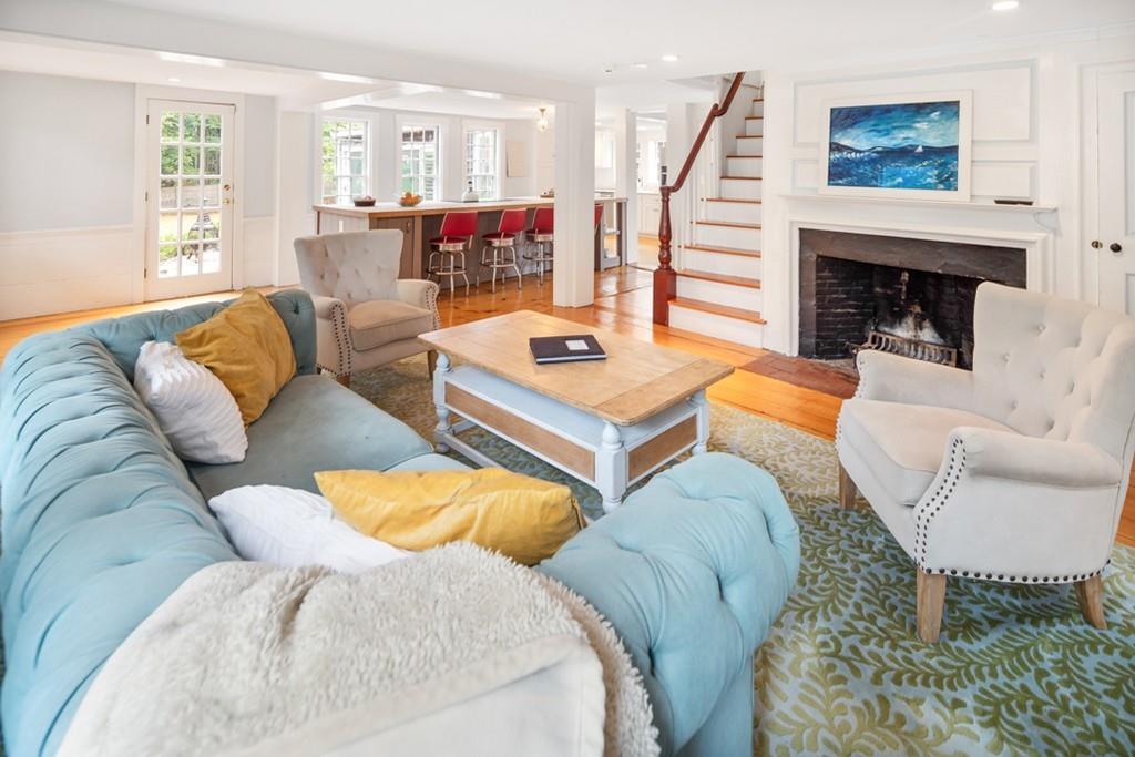347 Main Street Hingham, MA 02043 - Photo 11 of 34 a living room with furniture and a fireplace