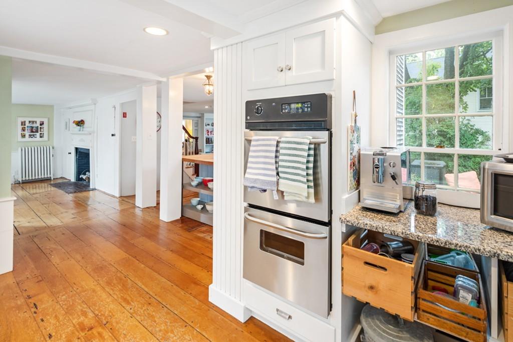 347 Main Street Hingham, MA 02043 - Photo 15 of 34 a kitchen with stainless steel appliances granite countertop a stove and a sink