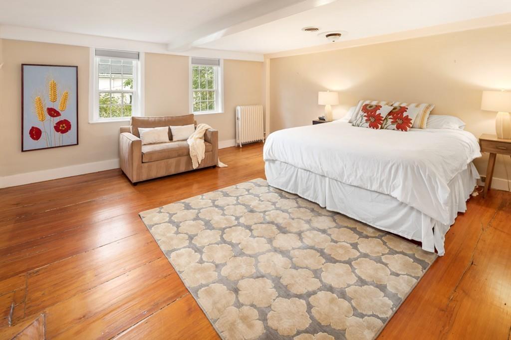 347 Main Street Hingham, MA 02043 - Photo 20 of 34 a bedroom with bed and a couch