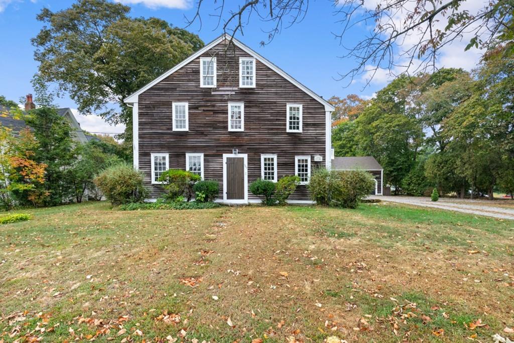 347 Main Street Hingham, MA 02043 - Photo 2 of 34 a front view of a house with a yard