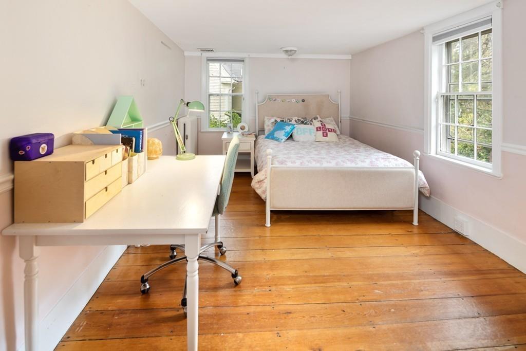 347 Main Street Hingham, MA 02043 - Photo 26 of 34 a living room with furniture and a table