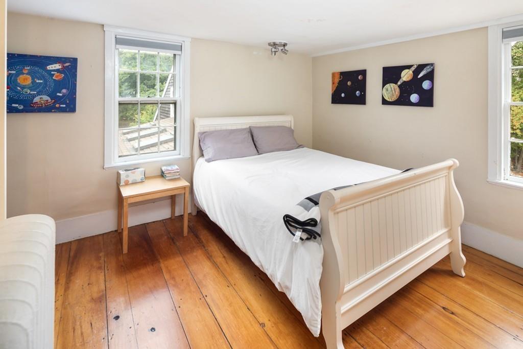 347 Main Street Hingham, MA 02043 - Photo 27 of 34 a bedroom with a bed and a window