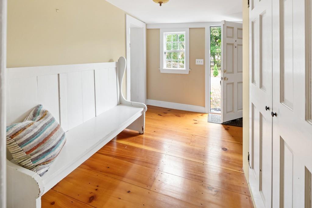 347 Main Street Hingham, MA 02043 - Photo 4 of 34 a view of an entryway with wooden floor and a window