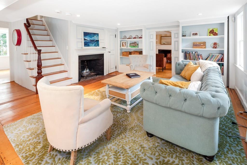 347 Main Street Hingham, MA 02043 - Photo 10 of 34 a living room with furniture and a fireplace