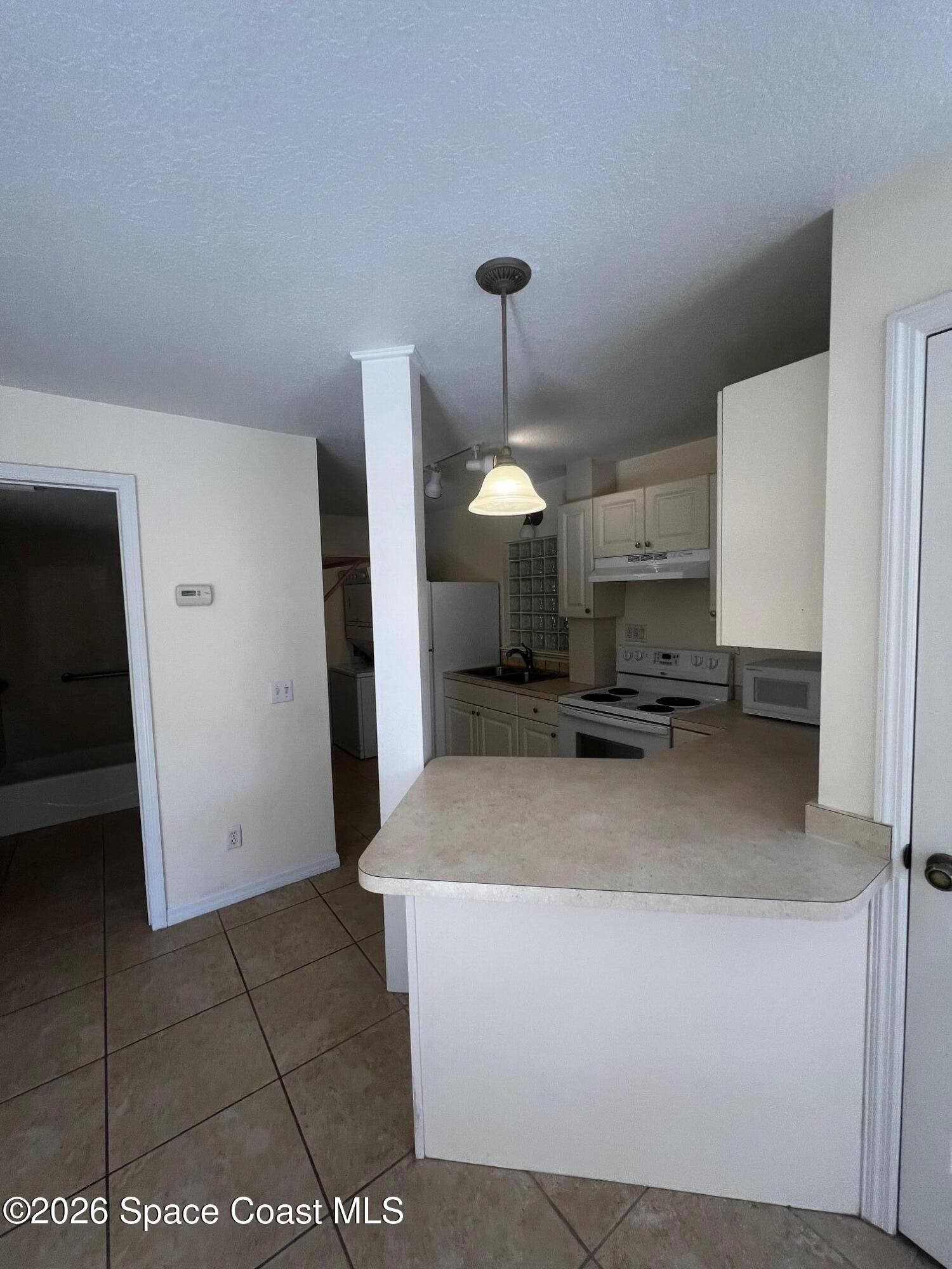 11195 Roseland Road, Unit 4 Sebastian, FL 32958 - Photo 9 of 15 IMG_2407