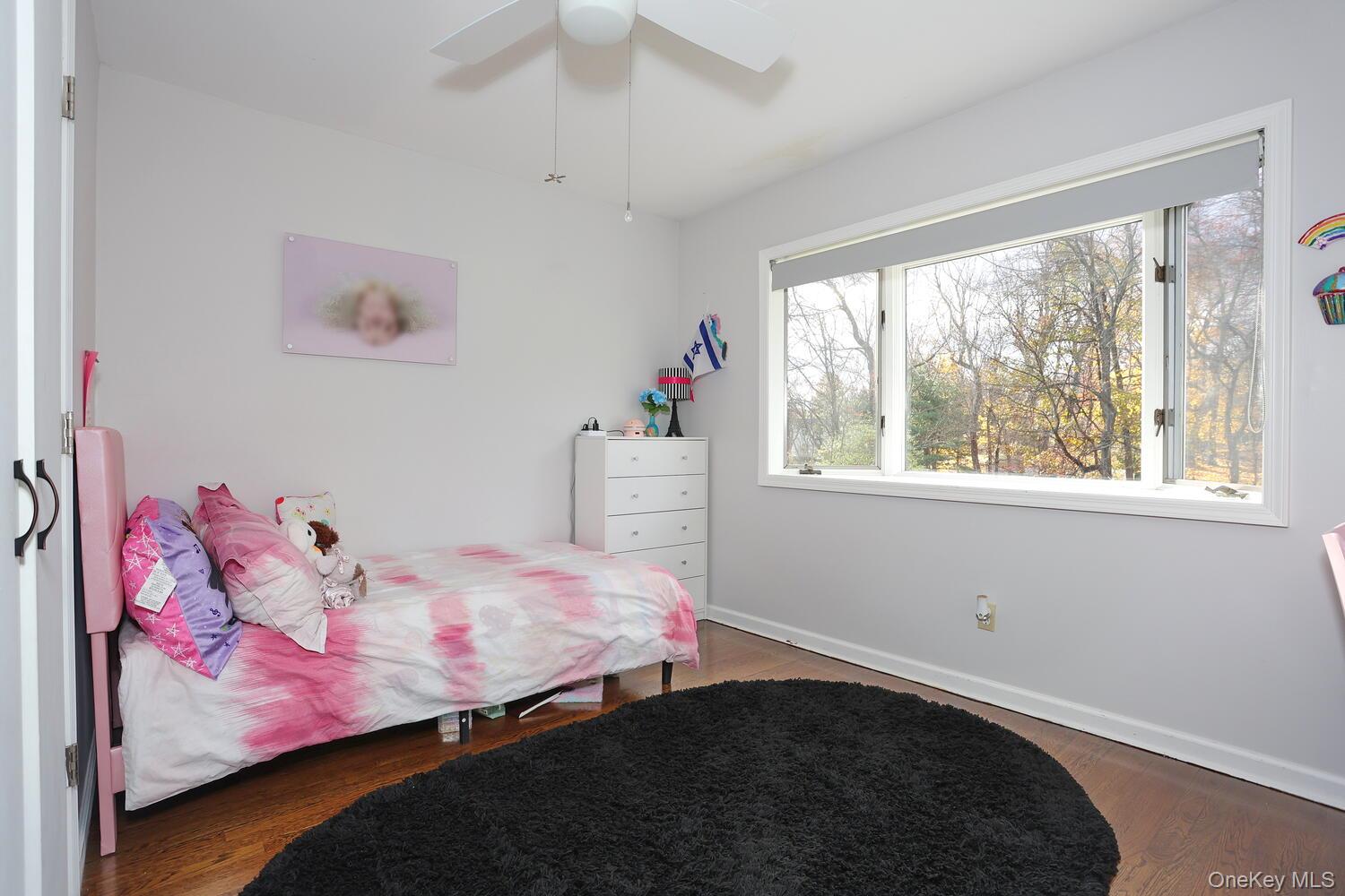 19 Augur Road Suffern, NY 10901 - Photo 16 of 35 a bedroom with a bed and a window