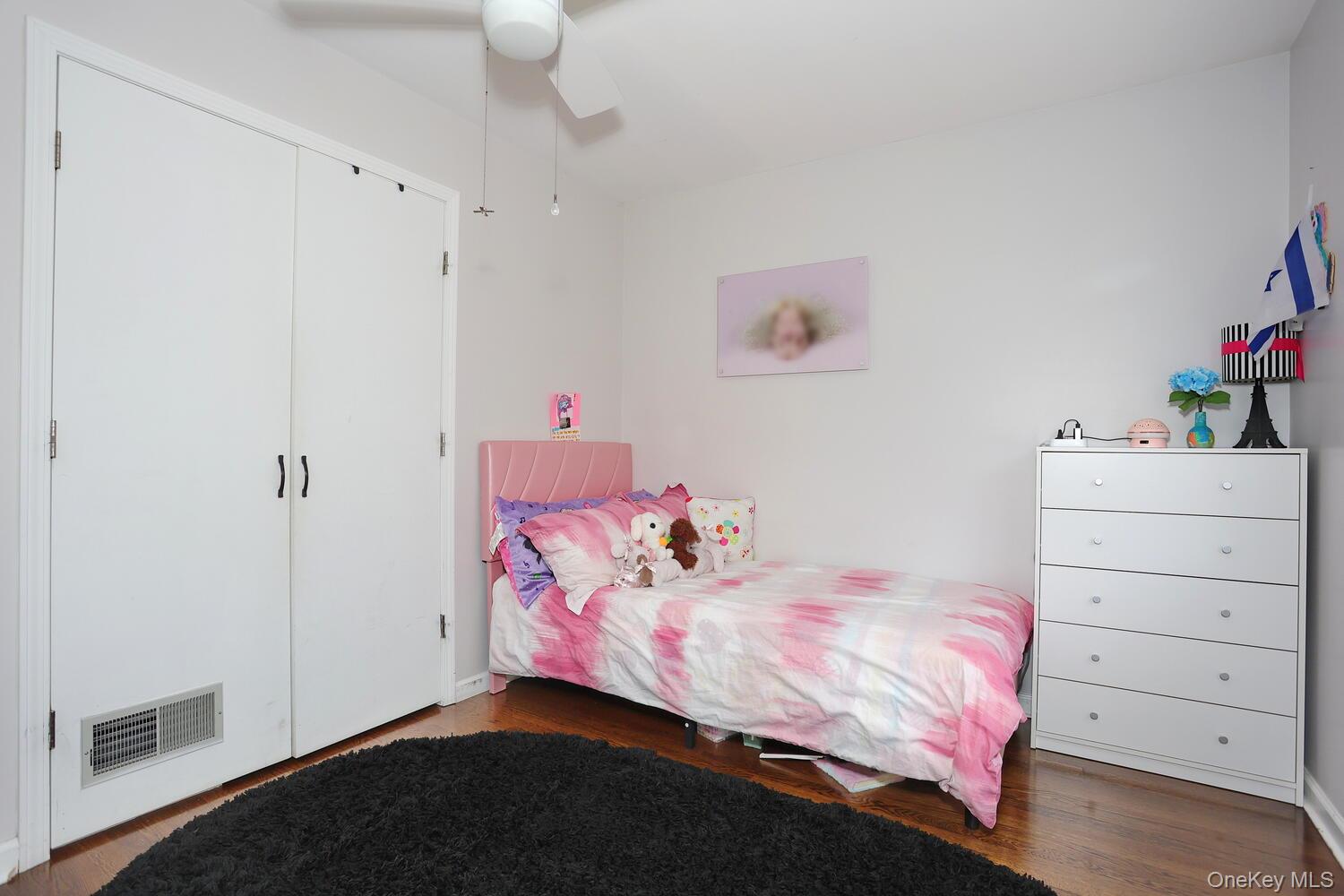 19 Augur Road Suffern, NY 10901 - Photo 17 of 35 a bedroom with a bed and a dresser