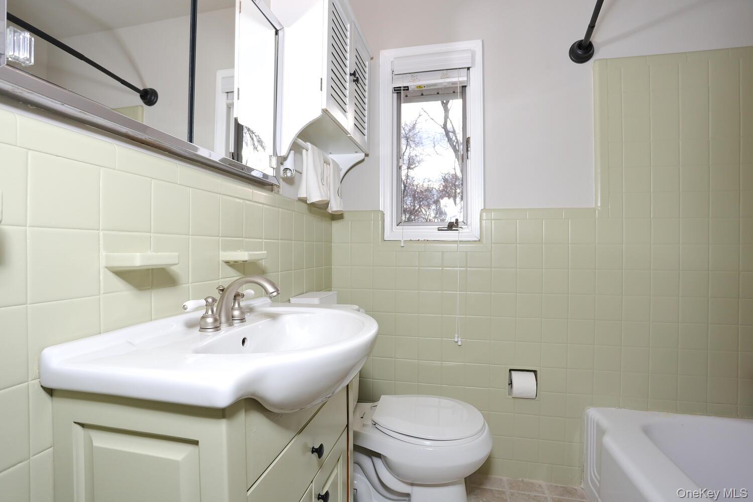 19 Augur Road Suffern, NY 10901 - Photo 18 of 35 a bathroom with a sink and a toilet
