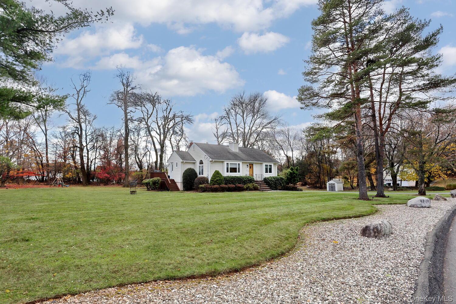 19 Augur Road Suffern, NY 10901 - Photo 25 of 35 a view of a building with a big yard and large trees