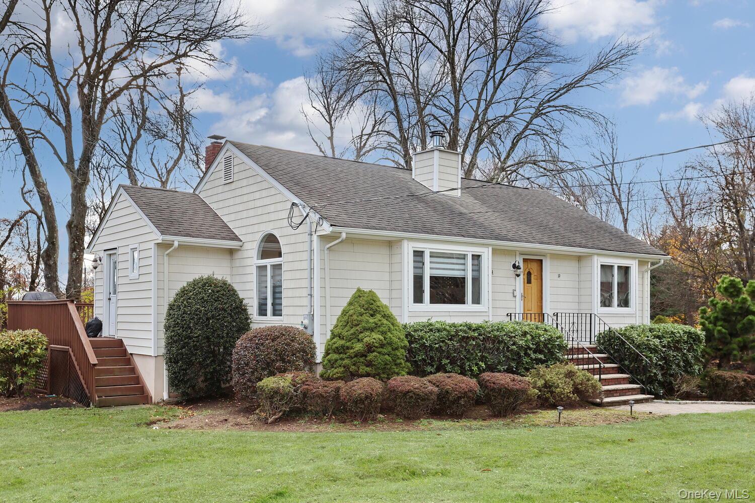 19 Augur Road Suffern, NY 10901 - Photo 27 of 35 a front view of a house with a yard and garage
