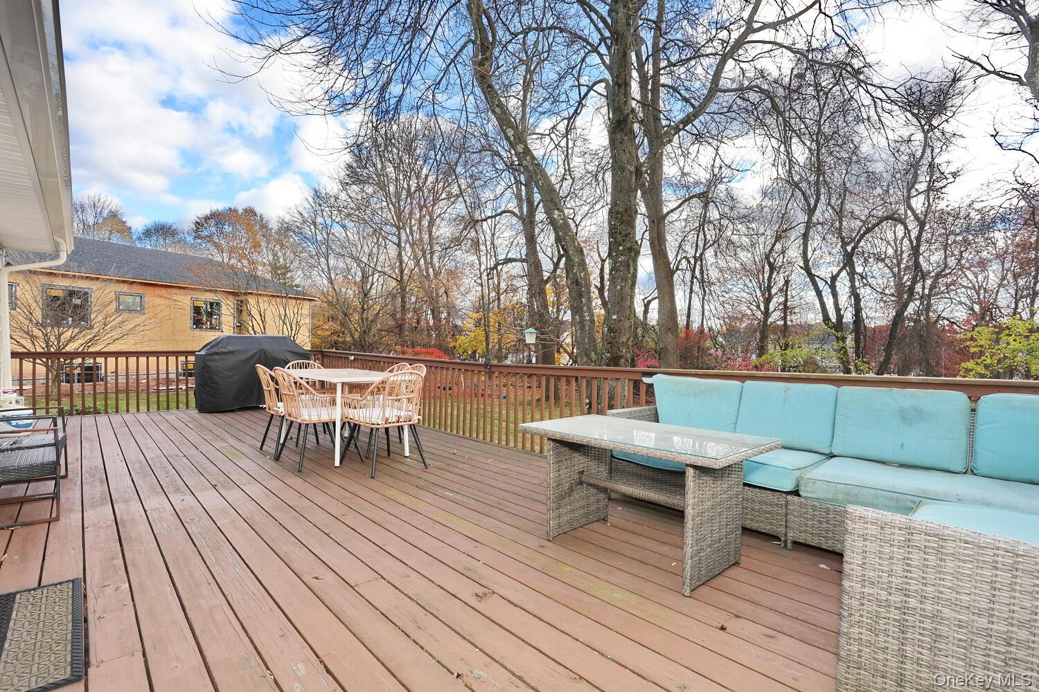 19 Augur Road Suffern, NY 10901 - Photo 32 of 35 a backyard of a house with wooden floor yard barbeque oven and outdoor seating