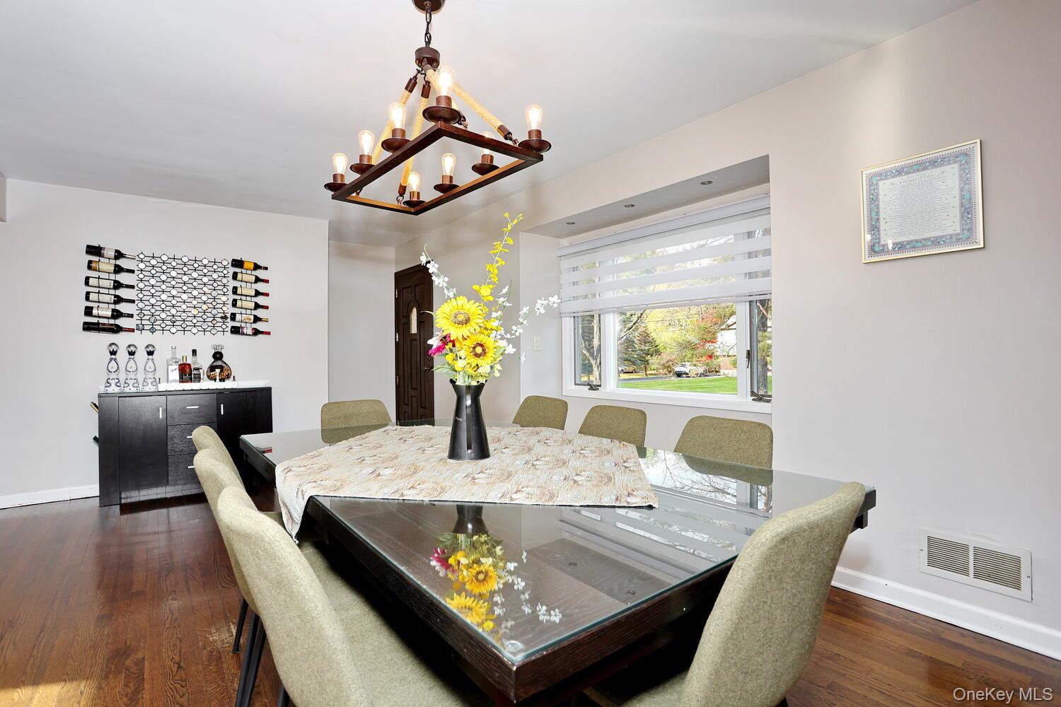 19 Augur Road Suffern, NY 10901 - Photo 6 of 35 a view of a dining room with furniture window and wooden floor