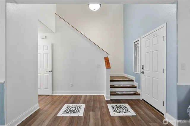 a view of an entryway with stairs