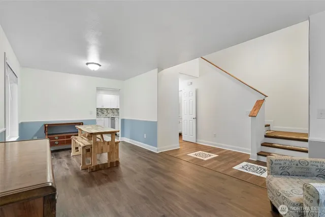 a furnished livingroom and entryway