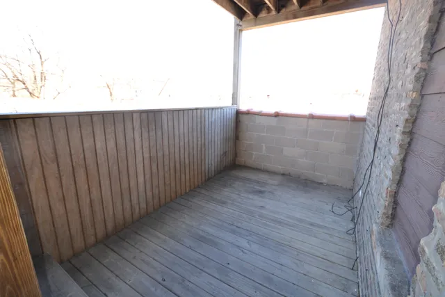 a view of a wooden fence