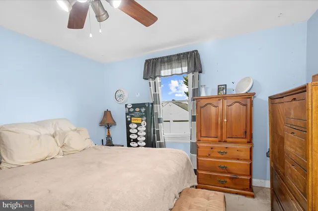 a bedroom with a bed and a closet